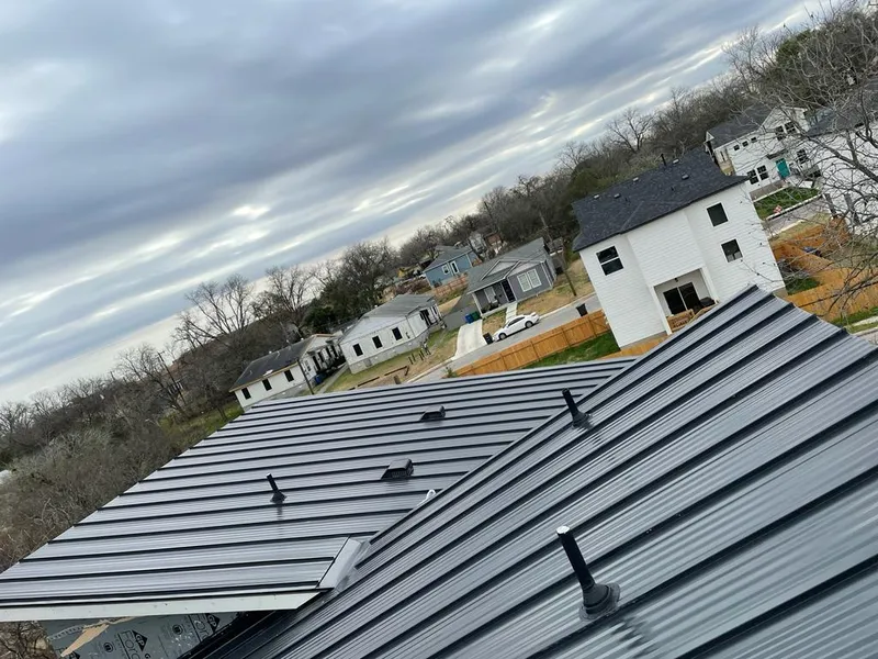 Standing seam metal roof panels with vents for Skylight Repair in Vandalia